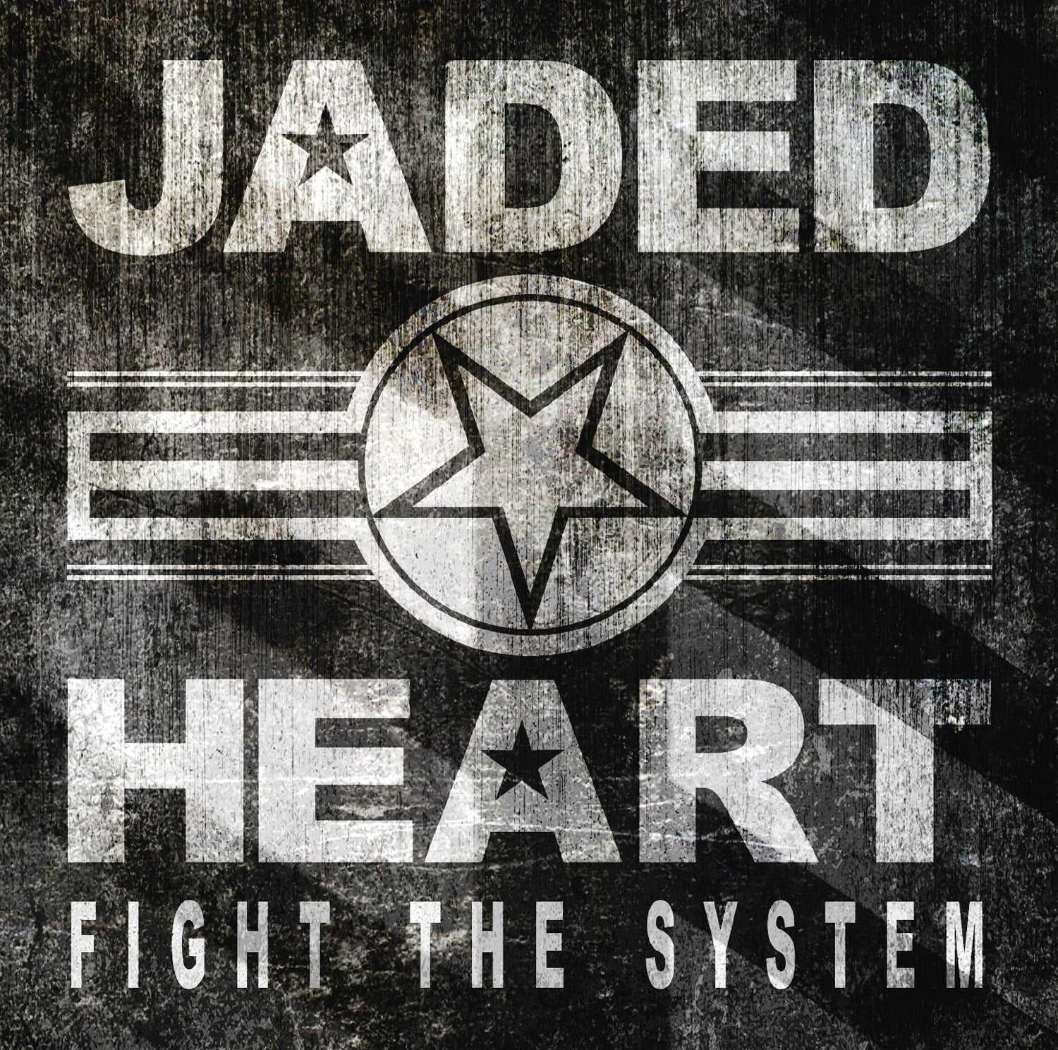 Close-up of Jaded Heart CD 'Fight The System' album cover showing distressed metal texture with bold white typography and star insignia.