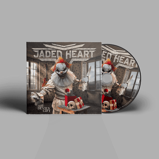 Jaded Heart CD 'Devil's Gift' digipack featuring a sinister clown with a knife, skull, and gift box in a dark room. Heavy metal music CD.