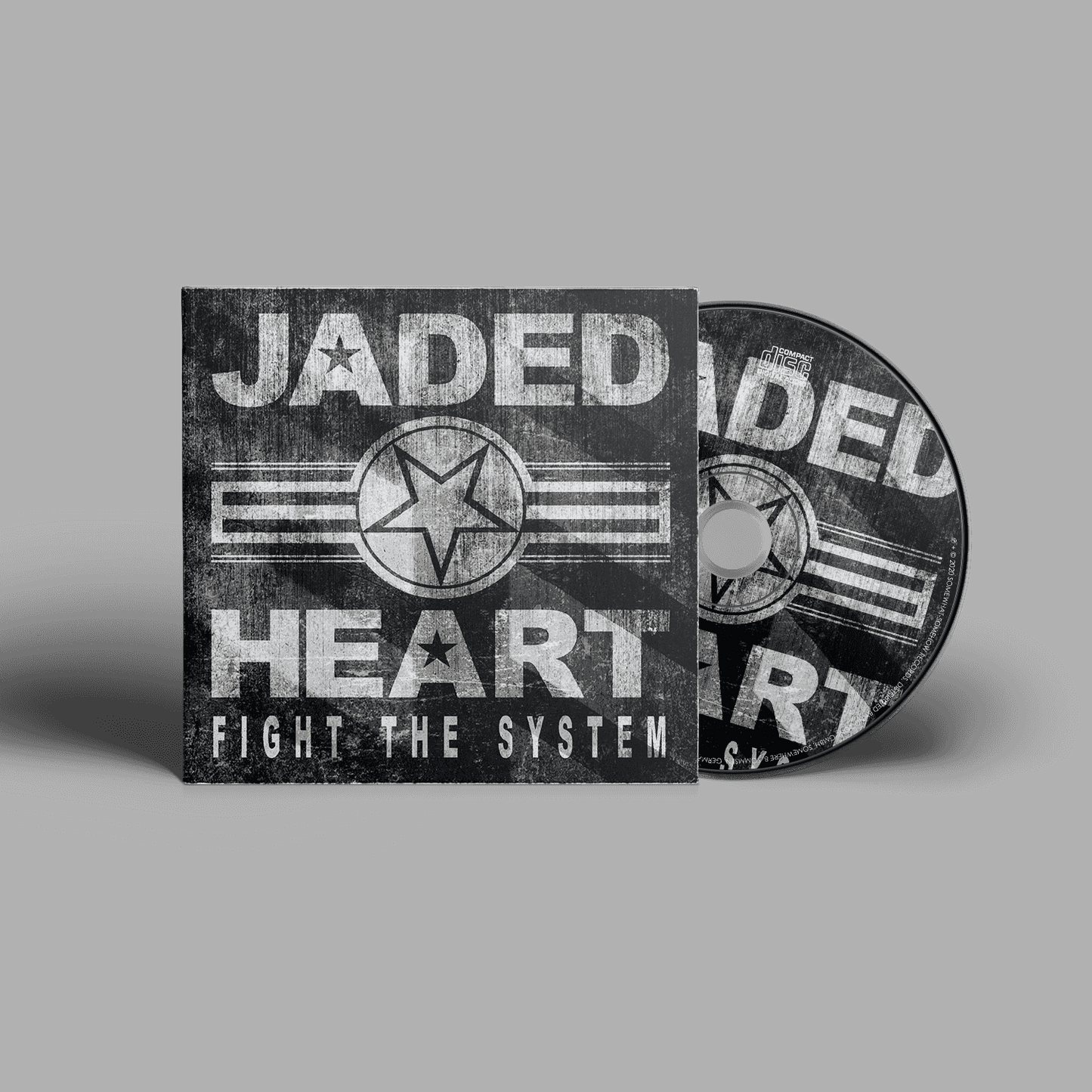 Jaded Heart CD 'Fight The System' in digipack format featuring industrial-style cover with bold white text and star emblem on dark background.