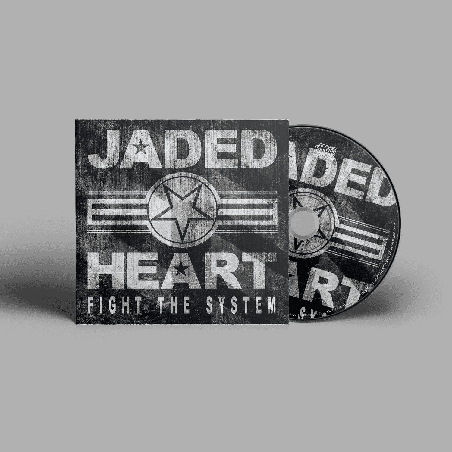 Jaded Heart CD 'Fight The System' in digipack format featuring industrial-style cover with bold white text and star emblem on dark background.