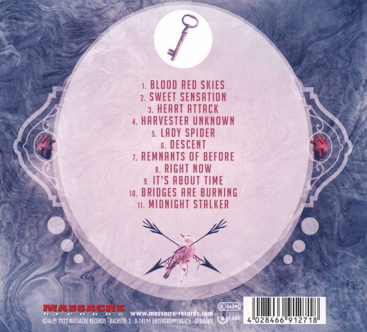 Back cover of Jaded Heart LP 'Heart Attack' Vinyl listing 11 tracks with a key and heart-themed artwork, distributed by Massacre Records.