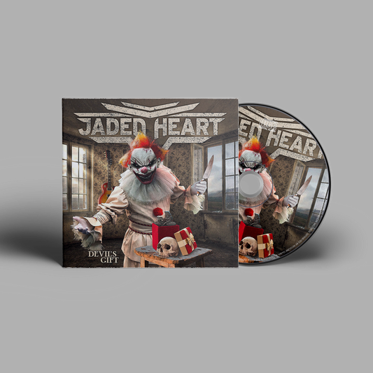 Jaded Heart CD 'Devil's Gift' digipack featuring a sinister clown with a knife, skull, and gift box in a dark room. Heavy metal music CD.